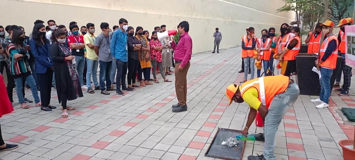 Fire Army Safety Solutions team briefing employees during an outdoor fire drill