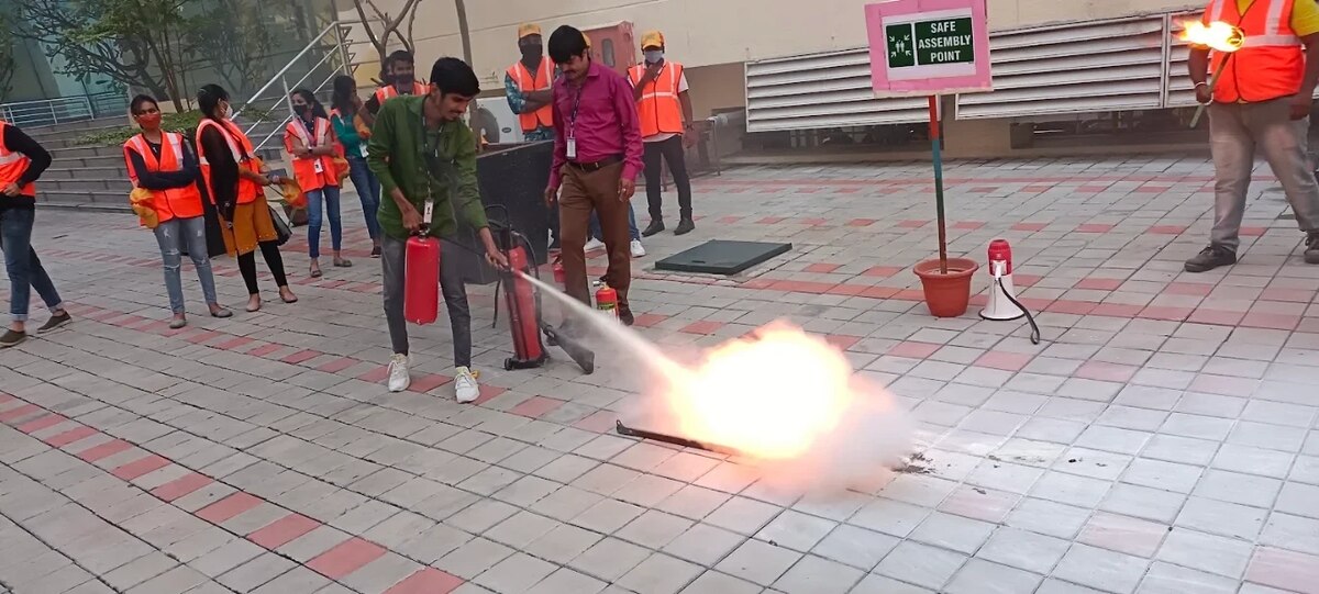 Live fire extinguisher demonstration during a Fire Army training session